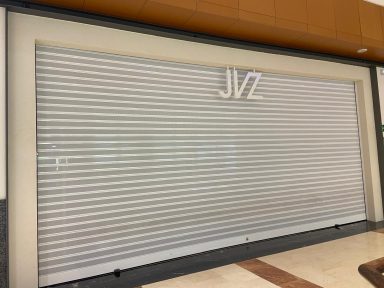 Cierre microperforado para local comercial